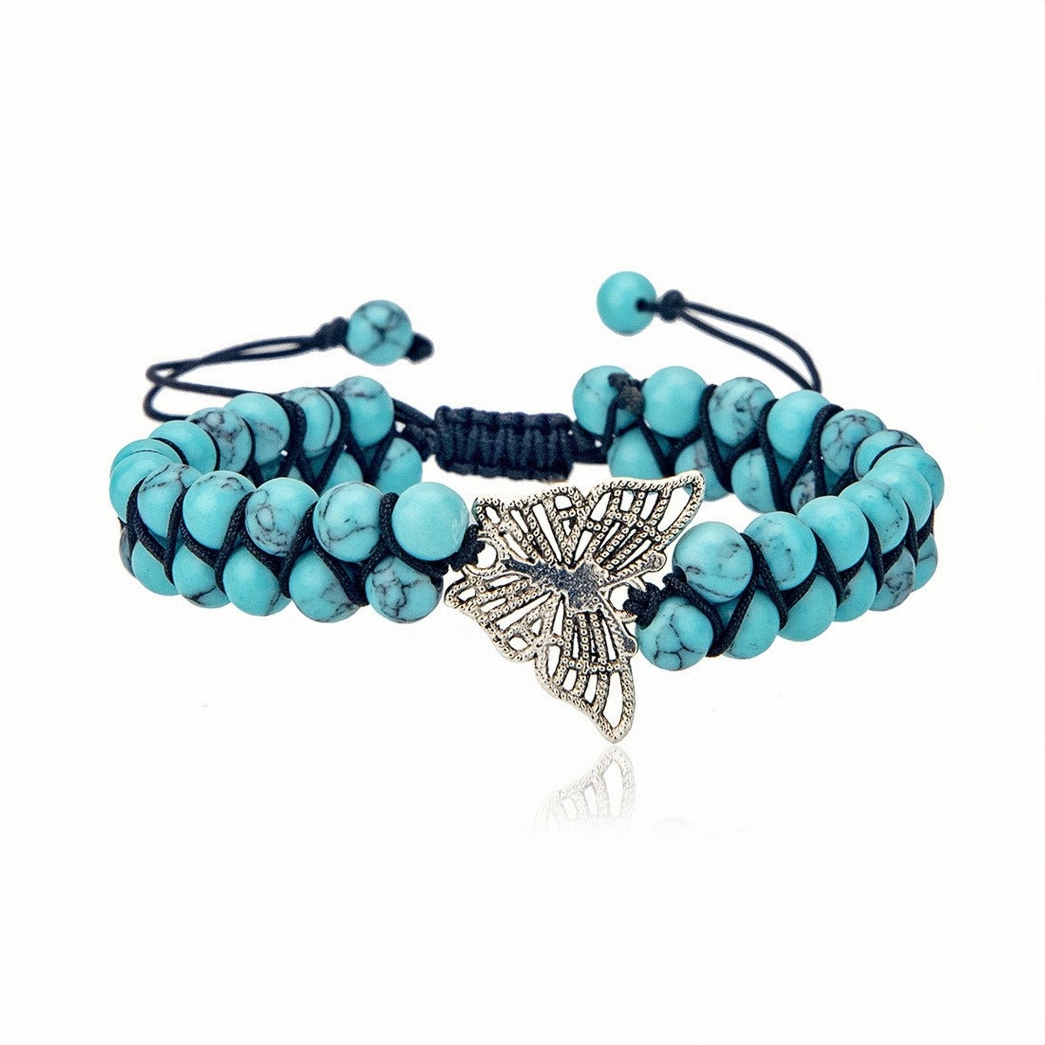 Double-row turquoise yoga bracelet with a central silver butterfly charm, presented on a white background.