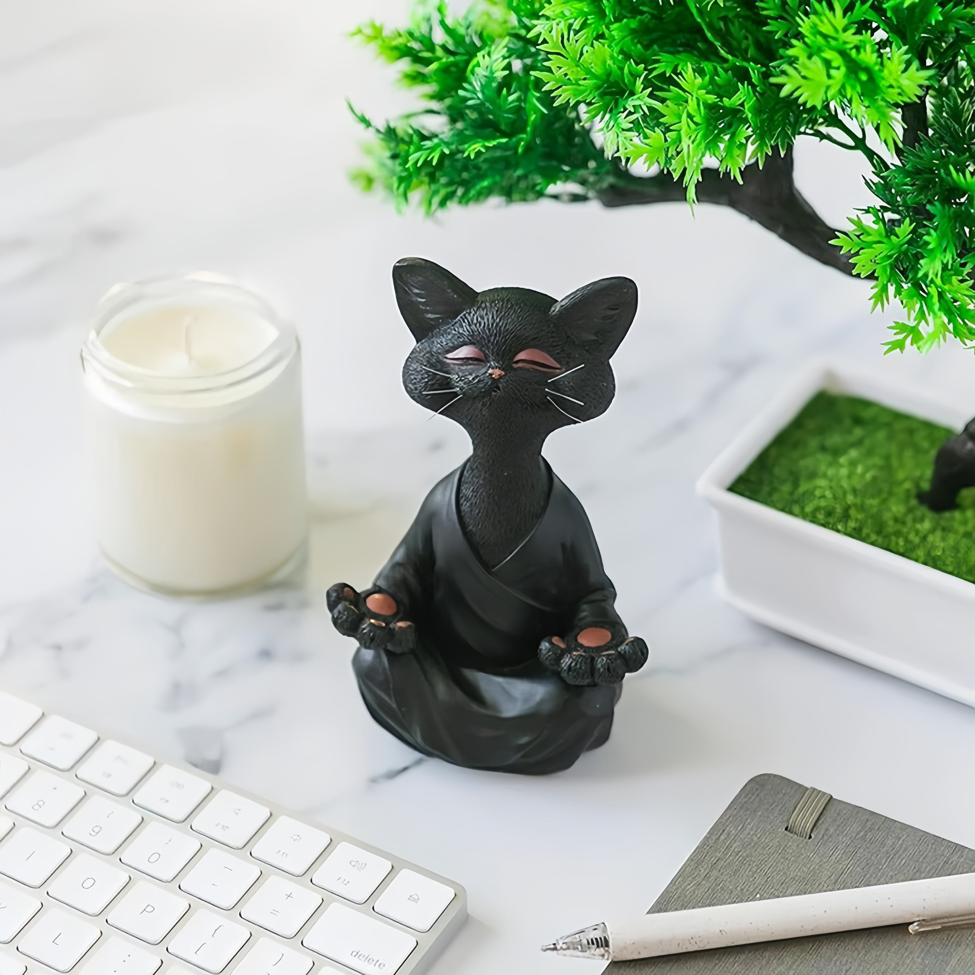 Meditation cat statue on a desk