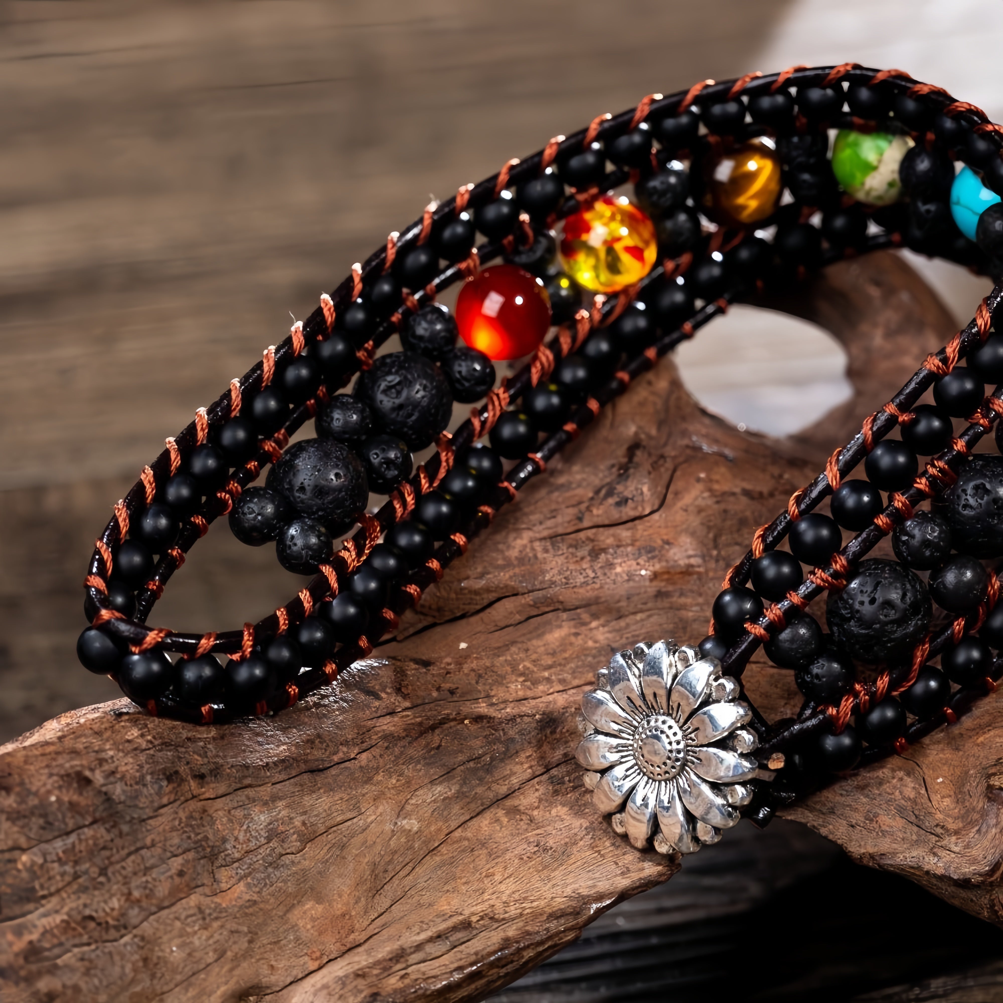 Detailed view of the unique design of the volcanic lava stone seven chakra bracelet
